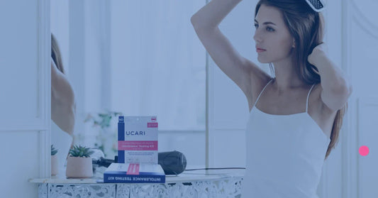 a woman pulling out hair for allergy test at home using UCARI At-Home testing kit 